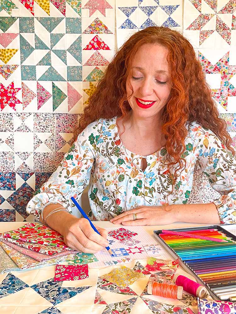 Alice Caroline designing Aurora Stars Rainbow Quilt BOM